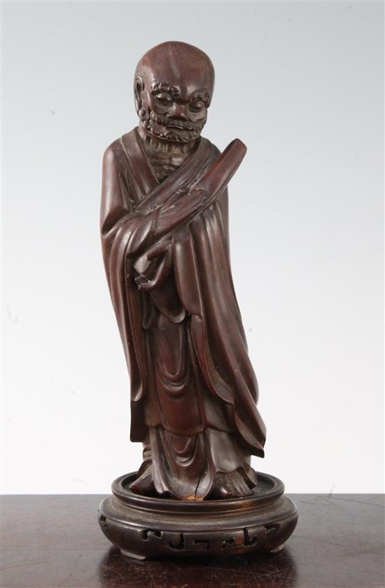 A Chinese hardwood figure of Luohan, 19th century, 18cm